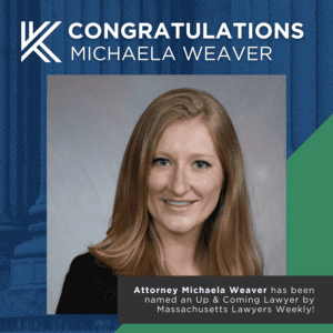 This image contains a headshot of Attorney Michaela Weaver, a trial attorney at Keches Law Group. Attorney Weaver is a Caucasian-appearing woman with strawberry blonde hair. The text on the graphic reads 