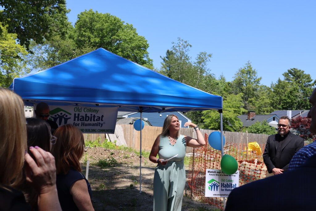 Old Colony Habitat for Humanity CEO Kim Thomas offers remarks at the groundbreaking ceremony.