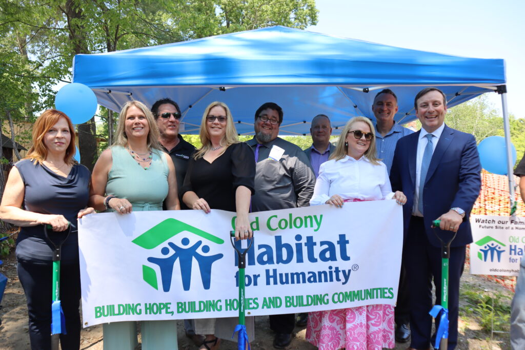 Keches Law Group Managing Partner Sean Flaherty and other corporate partners celebrate the groundbreaking of a new Old Colony Habitat for Humanity home build in Norton, Massachusetts.