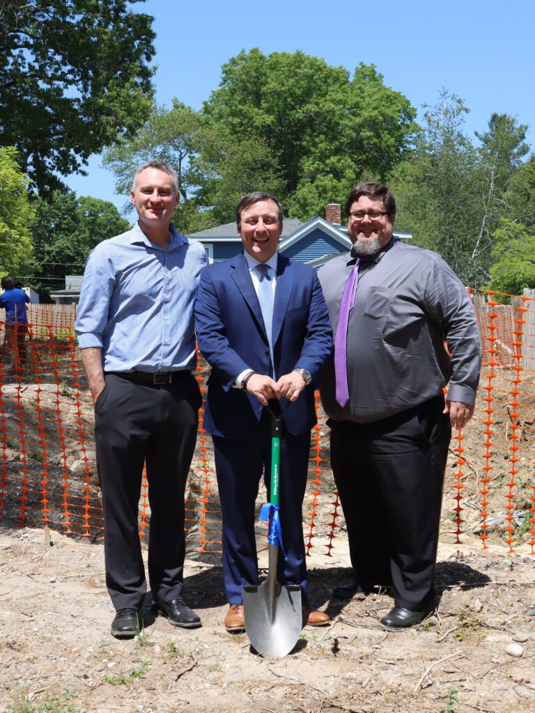 Keches Law Group leaders celebrate the groundbreaking on a new Old Colony Habitat for Humanity build in Norton.